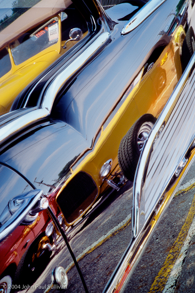 Yellow Rod Reflections - 1932 Ford Roadster in a Black 1957 Chevy